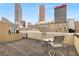 Private rooftop deck with city views and seating at 123 Luckie Nw St # 2210, Atlanta, GA 30303