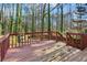 Wooden deck overlooking a wooded backyard at 1741 Charrington Way, Powder Springs, GA 30127