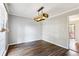 Dining room with hardwood floors and a rustic chandelier at 1741 Charrington Way, Powder Springs, GA 30127