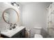 Bathroom with a modern vanity, large mirror, and shower at 257 Rock Garden Nw Ter, Marietta, GA 30064