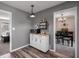 Dining area with built-in shelving and view into living room at 257 Rock Garden Nw Ter, Marietta, GA 30064