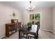 Bright dining room with hardwood floors and a view of the backyard at 257 Rock Garden Nw Ter, Marietta, GA 30064