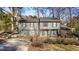 Two-story house with attached garage and fenced yard at 257 Rock Garden Nw Ter, Marietta, GA 30064