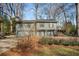 Green two-story house with a small yard at 257 Rock Garden Nw Ter, Marietta, GA 30064