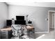 Home office featuring a large desk and ergonomic chair at 257 Rock Garden Nw Ter, Marietta, GA 30064