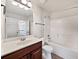 Bathroom with single vanity and tub shower combo at 8372 Members Dr, Jonesboro, GA 30236