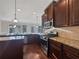 Kitchen features granite countertops and custom cabinetry at 8372 Members Dr, Jonesboro, GA 30236