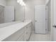 Bathroom with double vanity and white cabinets at 896 Farmstead Rd # 162, Suwanee, GA 30024