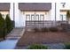 Private patio with brick flooring and wooden fence at 896 Farmstead Rd, Suwanee, GA 30024