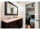 Double vanity bathroom with a large mirror and walk-in shower at 110 Golf Terrace Dr, Stockbridge, GA 30281