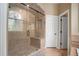 Large walk-in shower with glass enclosure and tile surround at 110 Golf Terrace Dr, Stockbridge, GA 30281