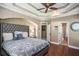 Main bedroom with hardwood floors and an ensuite bathroom at 110 Golf Terrace Dr, Stockbridge, GA 30281