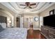 Main bedroom with hardwood floors and ensuite bathroom access at 110 Golf Terrace Dr, Stockbridge, GA 30281