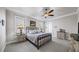 Bright bedroom with ceiling fan, and en-suite bathroom at 191 Foxtail Rd, Woodstock, GA 30188