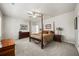 Bright and airy bedroom with a comfortable post bed at 191 Foxtail Rd, Woodstock, GA 30188