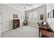 Bedroom with desk, bookcase, and window with shutters at 191 Foxtail Rd, Woodstock, GA 30188