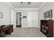 Bright bedroom with hardwood floors and built-in shelving at 191 Foxtail Rd, Woodstock, GA 30188