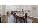 Bright dining room with hardwood floors and a view of the living room at 191 Foxtail Rd, Woodstock, GA 30188