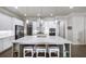 Modern kitchen with large island and stainless steel appliances at 191 Foxtail Rd, Woodstock, GA 30188