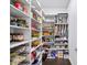 Well-organized pantry with ample shelving for storage at 191 Foxtail Rd, Woodstock, GA 30188