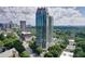 Modern high-rise building in a vibrant urban setting with green space at 2795 Peachtree Rd # 1305, Atlanta, GA 30305