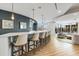 Modern bar area with counter seating and views of a landscaped outdoor terrace at 2795 Peachtree Rd # 1305, Atlanta, GA 30305