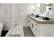 Modern bathroom featuring double sink vanity, and marble floors and accents at 2795 Peachtree Rd # 1305, Atlanta, GA 30305