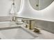 Bathroom featuring close up of double sinks with grey countertops and modern fixtures at 2795 Peachtree Rd # 1305, Atlanta, GA 30305