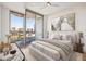 Bright bedroom with city views and access to a private balcony at 2795 Peachtree Rd # 1305, Atlanta, GA 30305