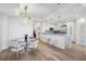 Elegant dining area with glass table and modern chairs at 2795 Peachtree Rd # 1305, Atlanta, GA 30305