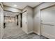 Carpeted hallway features neutral walls and access to elevators at 2795 Peachtree Rd # 1305, Atlanta, GA 30305