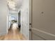 Hallway with wood floors that leads to open living area and city views at 2795 Peachtree Rd # 1305, Atlanta, GA 30305