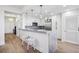 Modern white kitchen with marble countertops and stainless steel appliances at 2795 Peachtree Rd # 1305, Atlanta, GA 30305