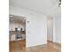 Modern kitchen with stainless steel appliances partially visible from hallway at 2795 Peachtree Rd # 1305, Atlanta, GA 30305