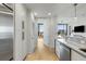Bright modern kitchen featuring stainless steel appliances, white cabinets and hardwood floors at 2795 Peachtree Rd # 1305, Atlanta, GA 30305