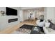 Bright living room featuring a fireplace, flatscreen tv, modern furniture and hardwood floors throughout at 2795 Peachtree Rd # 1305, Atlanta, GA 30305
