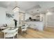 A modern living space showcases an open floor plan with a dining area and kitchen at 2795 Peachtree Rd # 1305, Atlanta, GA 30305
