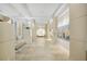 Bright and open lobby area with tiled floors, neutral colors, and stylish artwork at 2795 Peachtree Rd # 1305, Atlanta, GA 30305