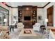 Inviting lounge area with built-in shelving, a television, and cozy seating at 2795 Peachtree Rd # 1305, Atlanta, GA 30305