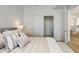 Inviting main bedroom features a neutral color palette, plush bedding, and a walk-in closet at 2795 Peachtree Rd # 1305, Atlanta, GA 30305