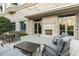 A lovely patio with a table, fireplace and chairs is perfect for outdoor relaxation at 2795 Peachtree Rd # 1305, Atlanta, GA 30305