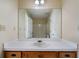 Bathroom with vanity, mirror and shower/tub combo at 120 Paces Lakes Pt, Dallas, GA 30157