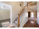 Bright entryway with hardwood floors and staircase at 120 Paces Lakes Pt, Dallas, GA 30157