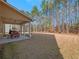 Spacious backyard with grassy area and wooded backdrop at 1227 Clear Stream Rdg, Auburn, GA 30011