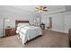 Well-lit bedroom with ensuite bathroom access at 1227 Clear Stream Rdg, Auburn, GA 30011