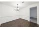 Bright dining room featuring hardwood floors and chandelier at 2408 Country Park Se Dr, Smyrna, GA 30080