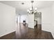 Dining room with hardwood floors, chandelier, and fireplace view at 2408 Country Park Se Dr, Smyrna, GA 30080