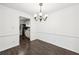 Dining room with hardwood floors and view of kitchen at 2408 Country Park Se Dr, Smyrna, GA 30080