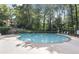 Community swimming pool nestled in a wooded setting at 2408 Country Park Se Dr, Smyrna, GA 30080