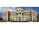 Forsyth County Courthouse exterior with classic architecture, featuring columns and a well-manicured lawn at 6935 Melody Ridge Rd, Buford, GA 30518